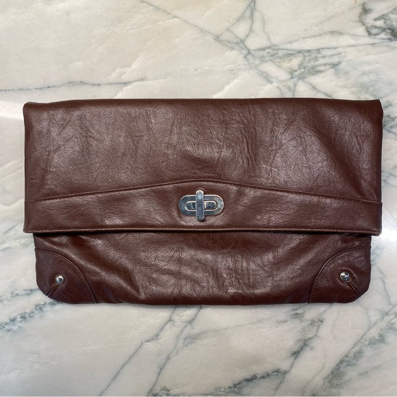 Charlotte Russe Handbags - Charlotte Russe Clutch Leather Bag